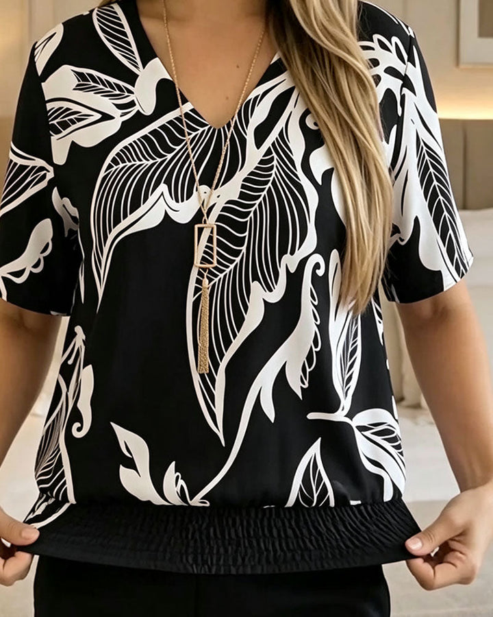 Isheba – Bluză Elegantă Cu Mâneci Scurte